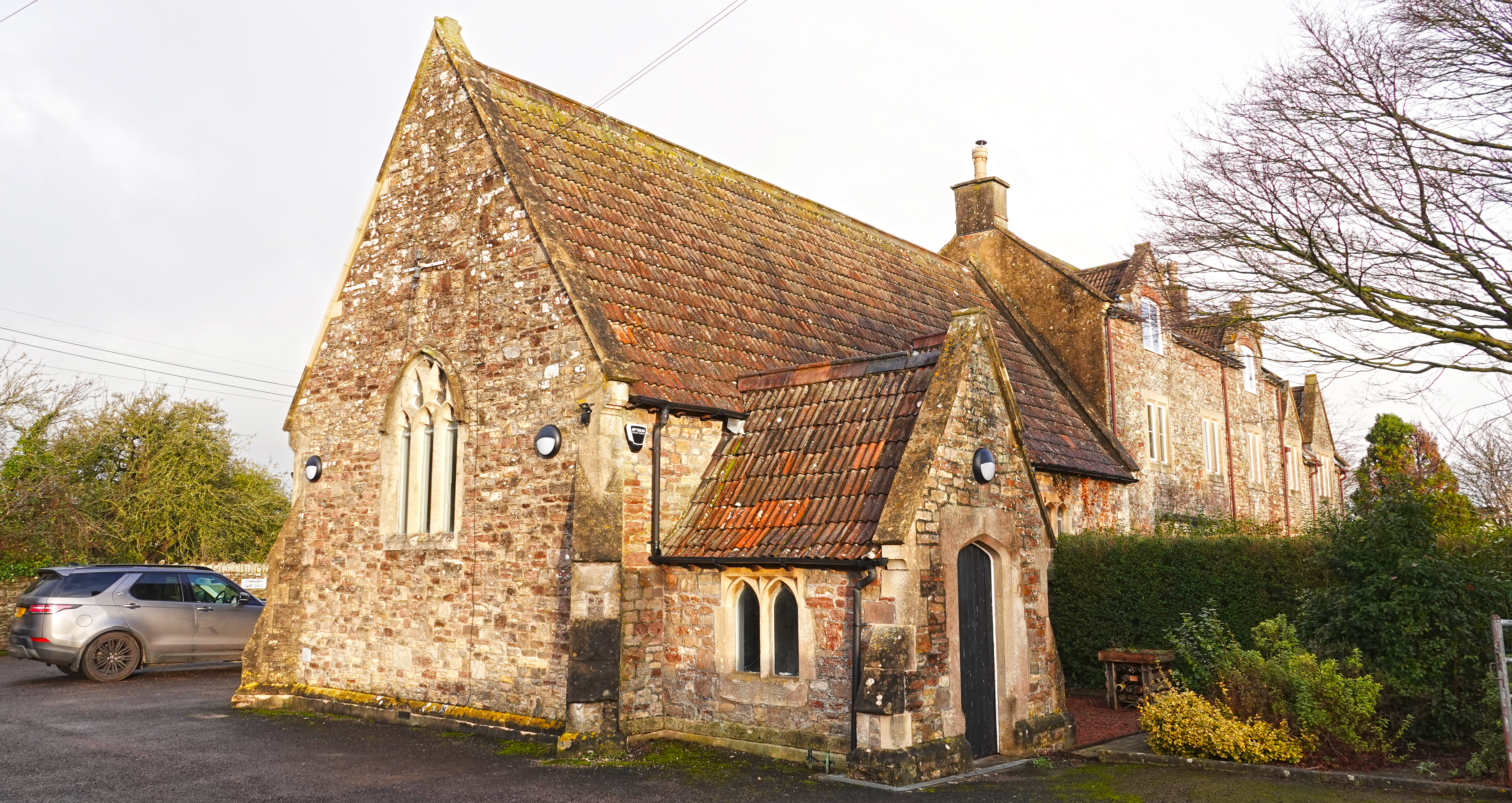 AV equipment installation services at a village hall exterior.